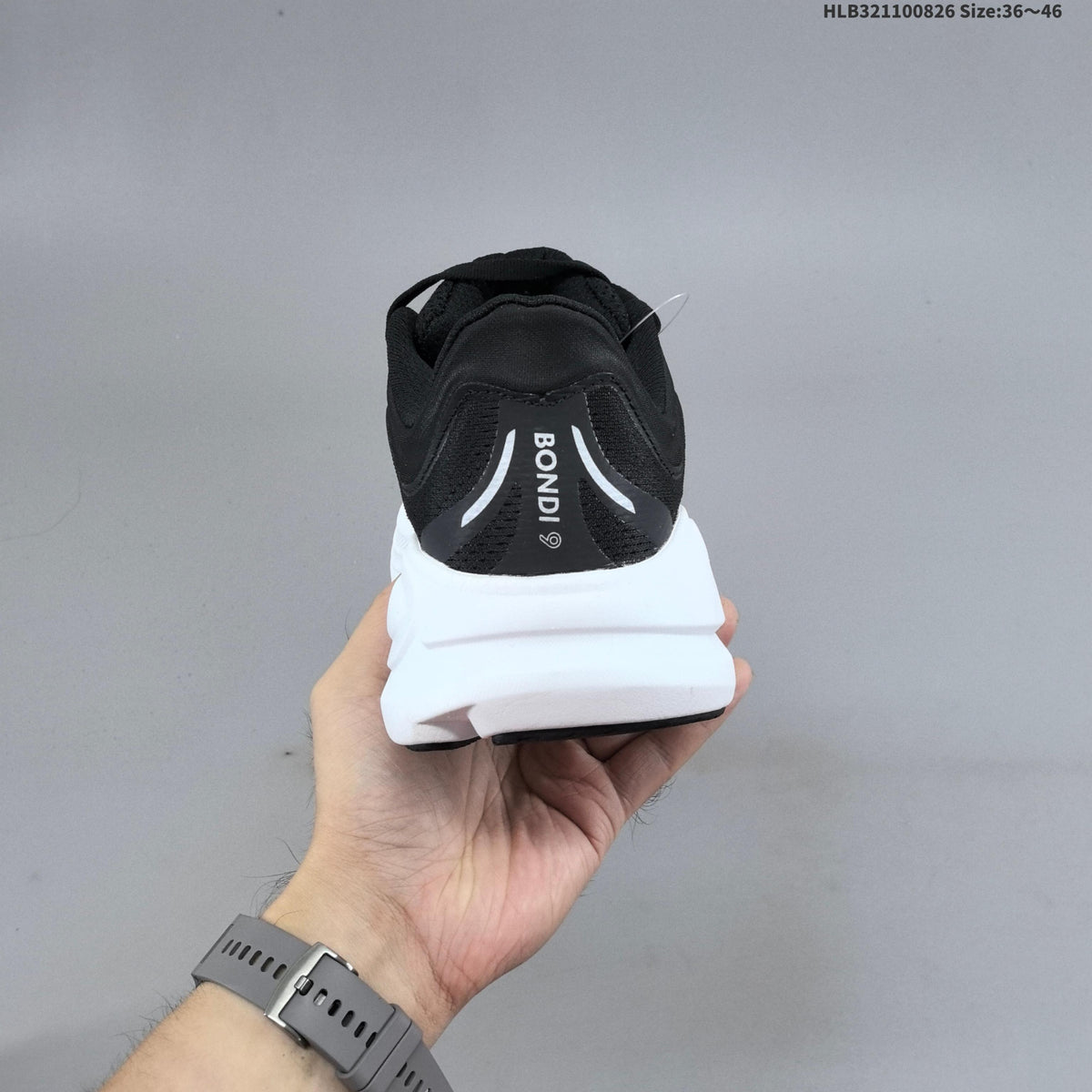 HOKA Bondi 9 Running Shoes in Black and White - product image from the listing.