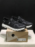 On Cloud 6 Running Sneakers in Black White - product image from the listing.