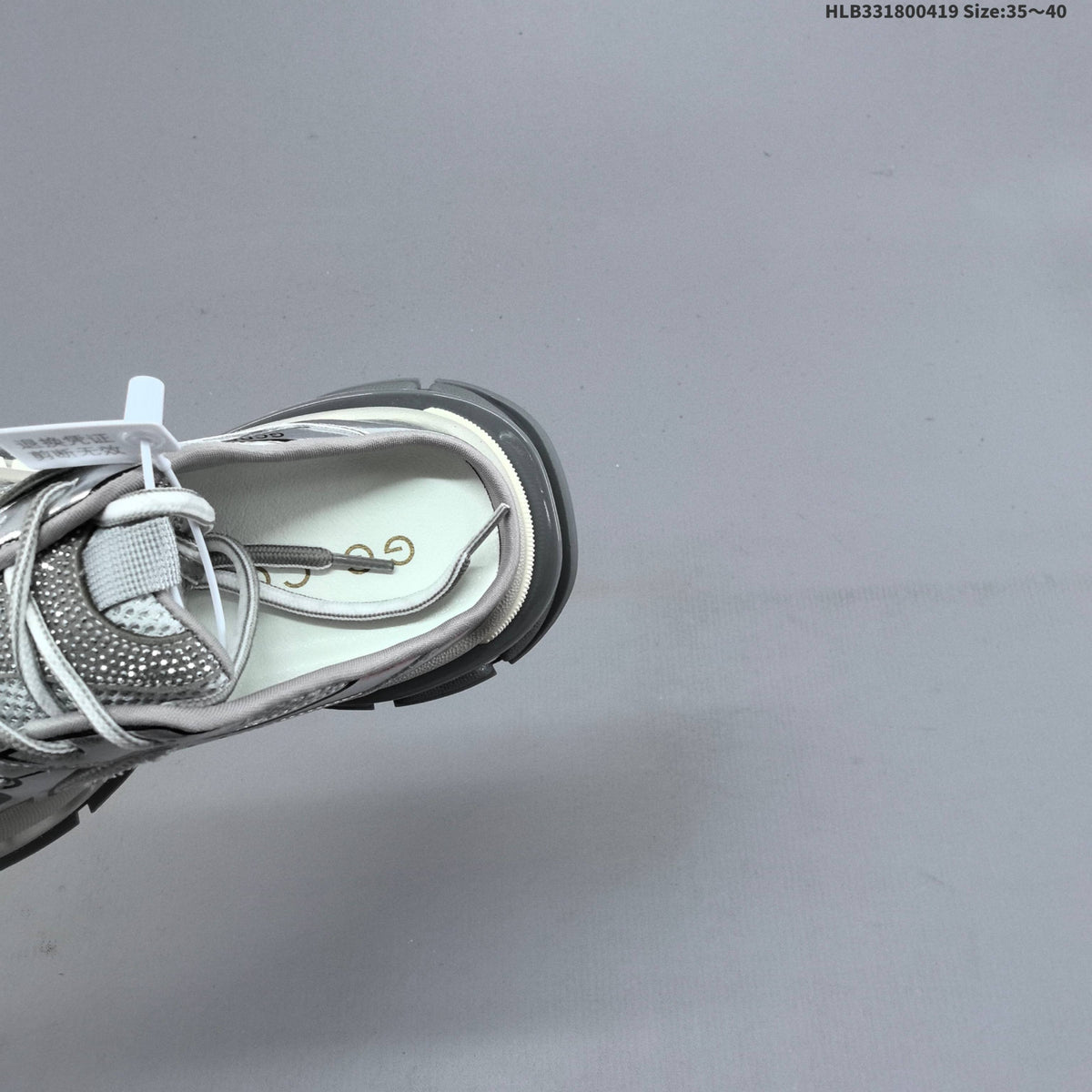 GCDS Silver Lace-Detail Backless Trainers - product image from the listing.