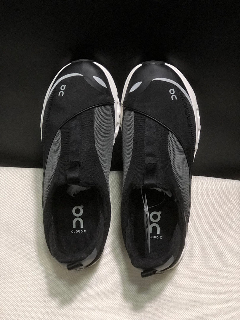 On Cloud X 4 Coast Sneakers in Black and White - product image from the listing.