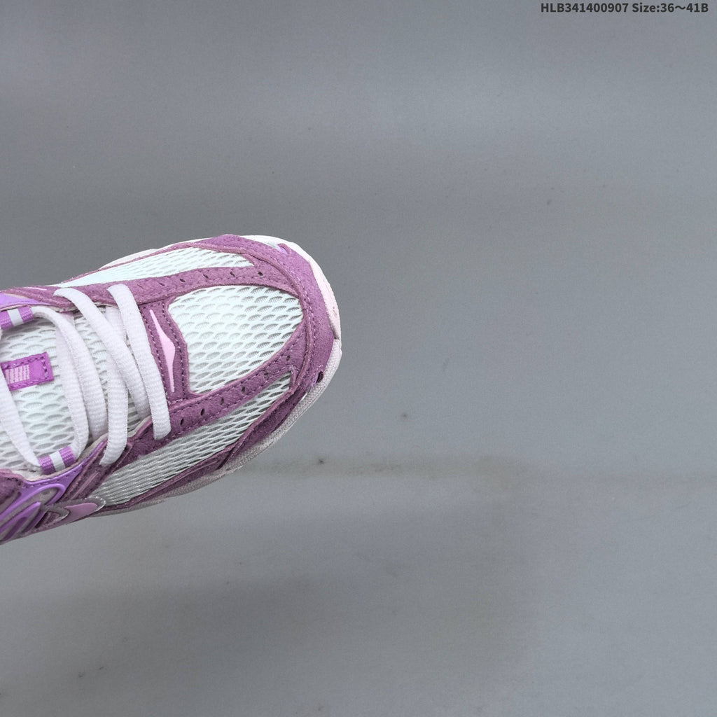 White and Purple Nike Air Max Moto Sneakers - product image from the listing.