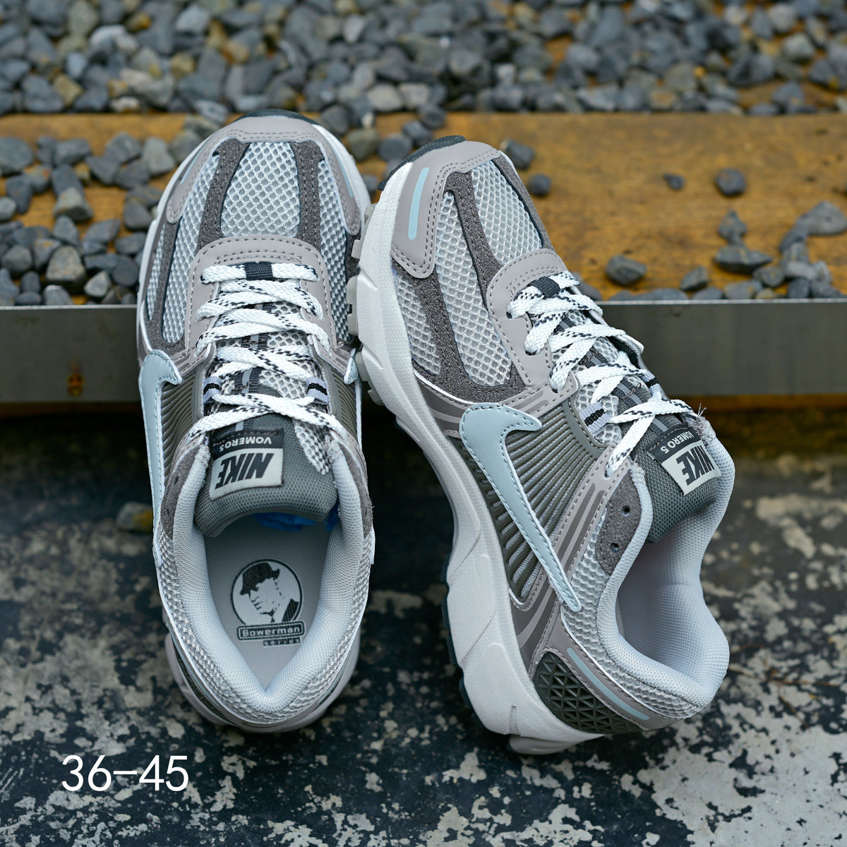 Grey Nike Air Zoom Vomero 5 Running Shoes - product image from the listing.
