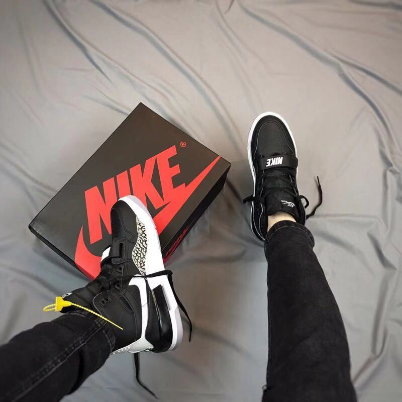 Air Jordan Legacy 312 High-Top Sneakers in Black and White - product image from the listing.