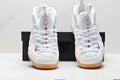Nike Air Penny Foamposite Sneakers in White and Gum - product image from the listing.