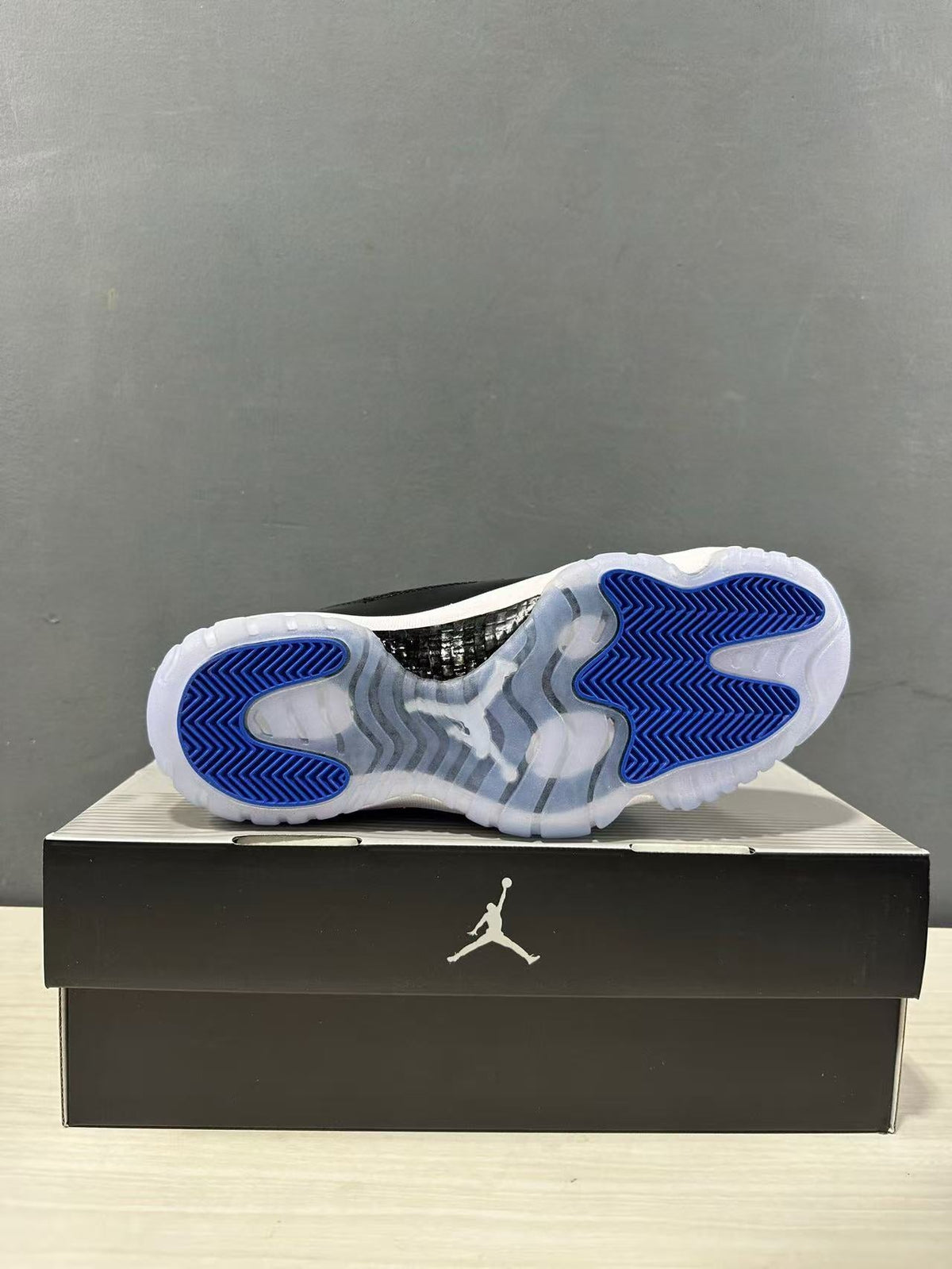 Air Jordan 11 Retro High Sneakers Black Blue CT8012-900 - product image from the listing.