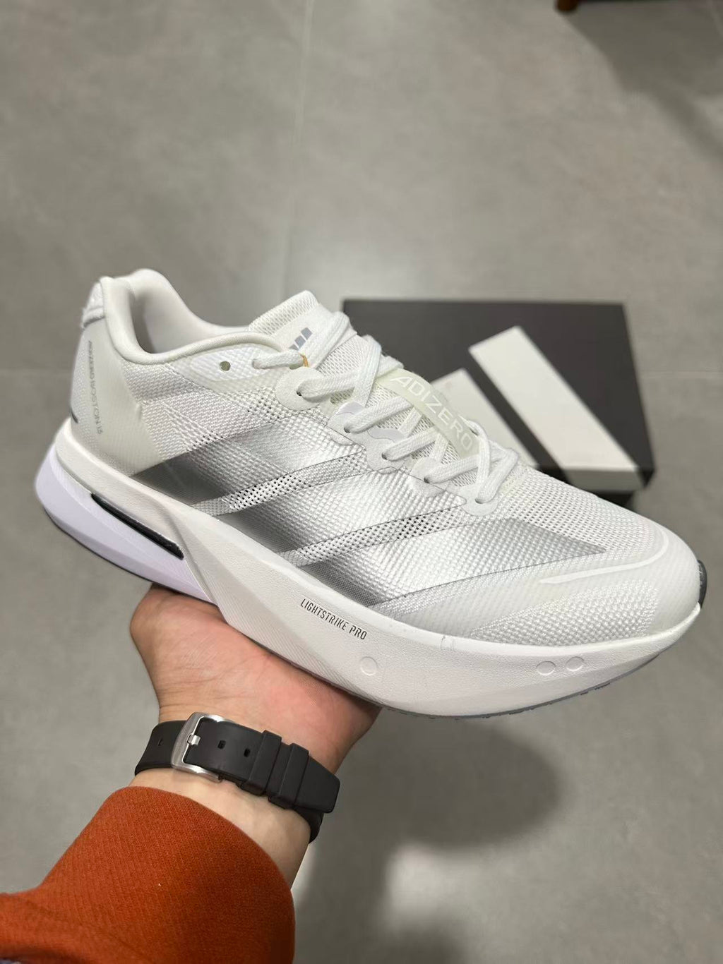 Adidas Adizero Lightstrike Pro Running Shoes in White - product image from the listing.
