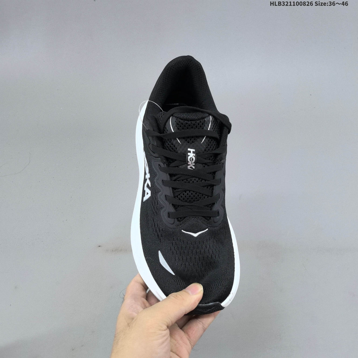 HOKA Bondi 9 Running Shoes in Black and White - product image from the listing.