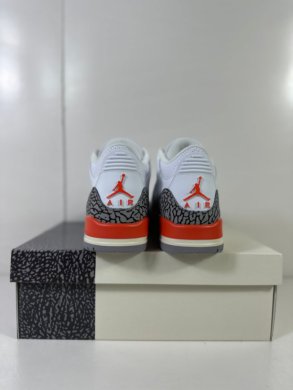 Air Jordan 3 Retro WMNS Georgia Peach Sneakers - product image from the listing.