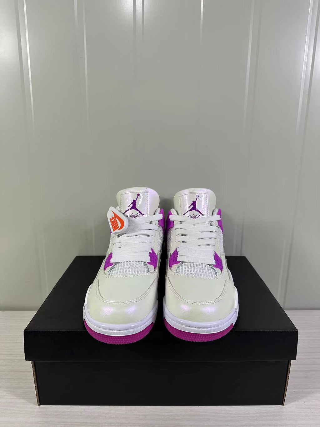 Air Jordan 4 Retro Hyper Violet Sneakers FQ1314-151 - product image from the listing.