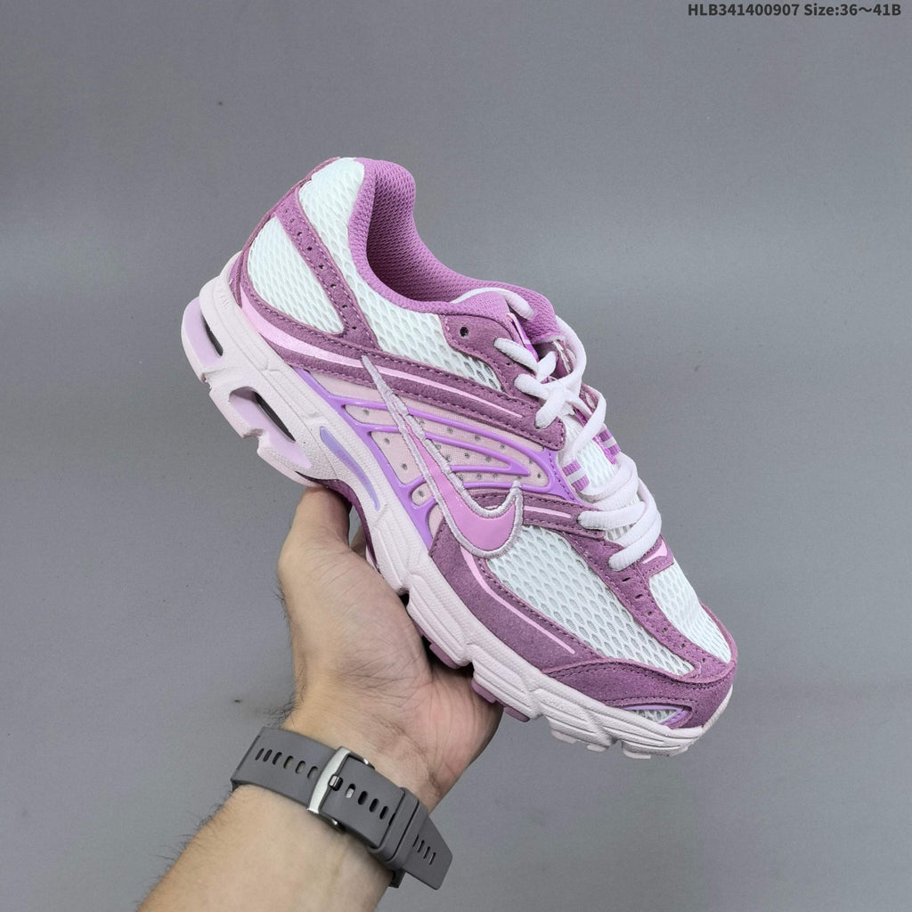White and Purple Nike Air Max Moto Sneakers - product image from the listing.
