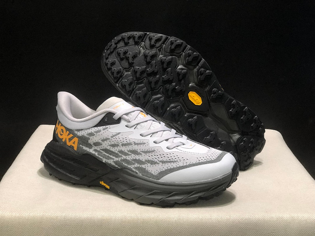 HOKA Speedgoat 5 Trail Running Shoes in White Gray - product image from the listing.