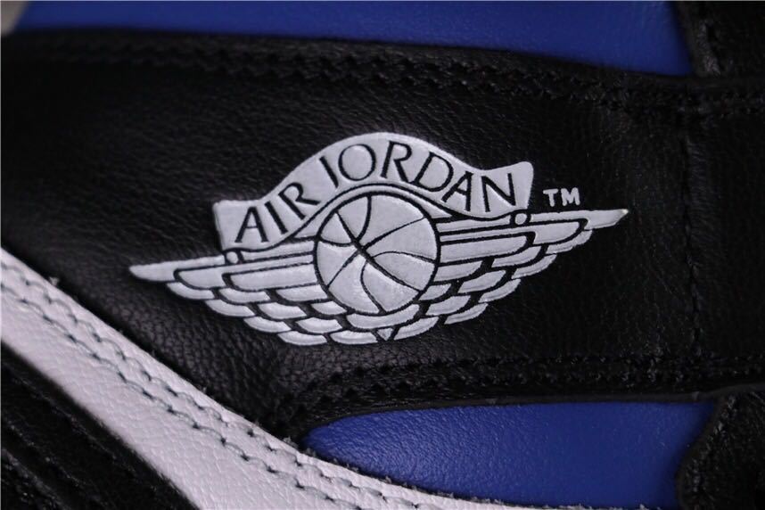 Air Jordan 1 Game Royal High-Top Sneakers in Black Blue White - product image from the listing.