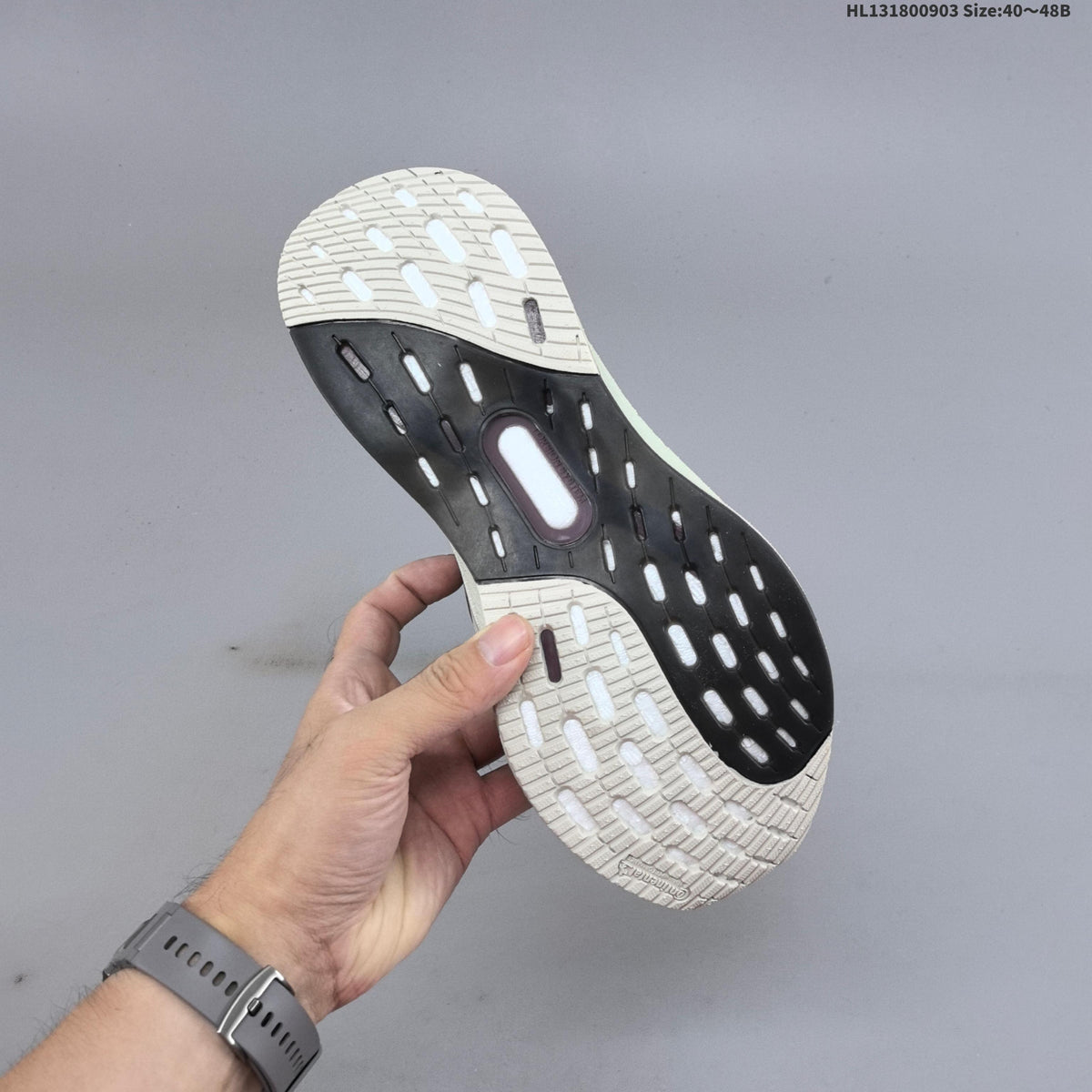 Adidas Ultraboost 5 Running Shoes, in Charcoal and Cream - product image from the listing.