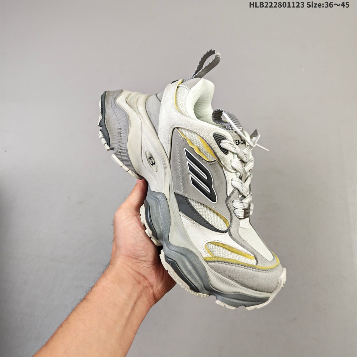 Balenciaga Monday Low-Top Sneakers in White, in Gray and Yellow - product image from the listing.