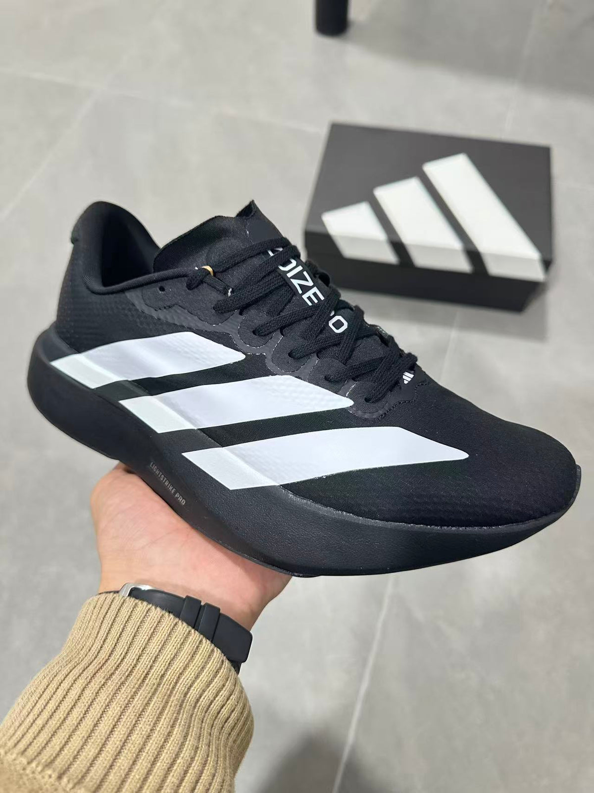 Adidas Lightstrike Pro Running Shoes in Black White KJ3595 - product image from the listing.
