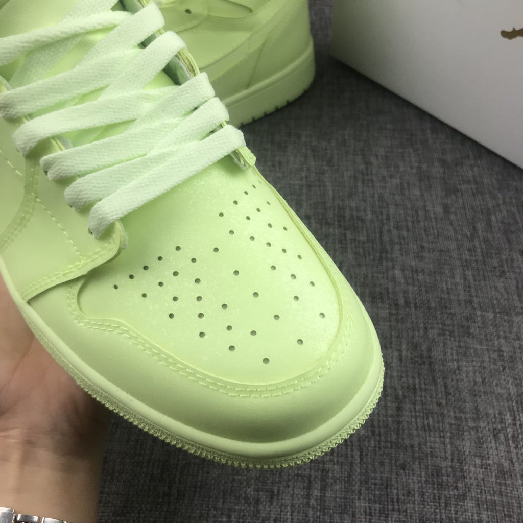 Air Jordan 1 Mid AH7389-700 Sneakers in Volt - product image from the listing.