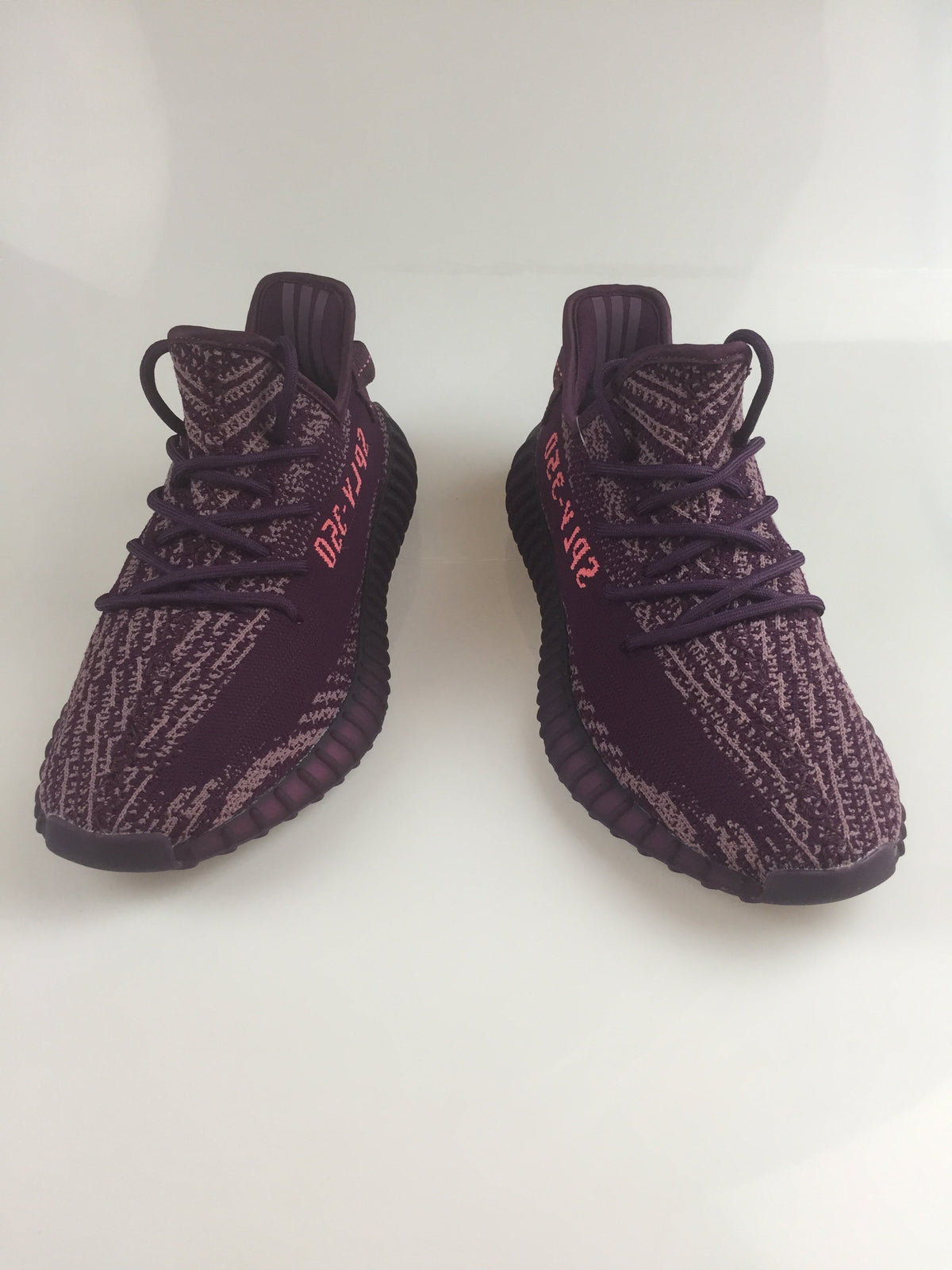 Black and Beige Yeezy 350 V2 Knit Sneakers - product image from the listing.