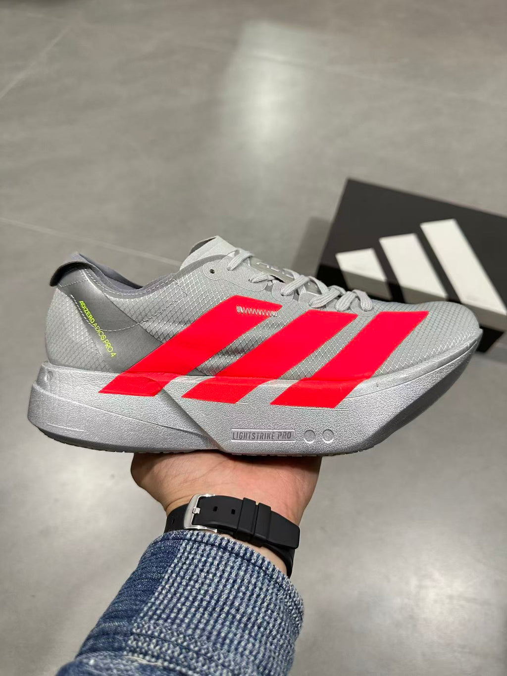 adidas Adizero Prime X 2.0 STRUNG Running Shoes in Grey Red - product image from the listing.