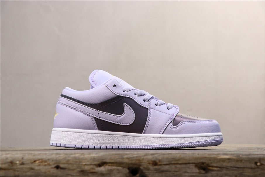 Air Jordan 1 Low GS Oxygen Sneakers in Purple 554723-505 - product image from the listing.