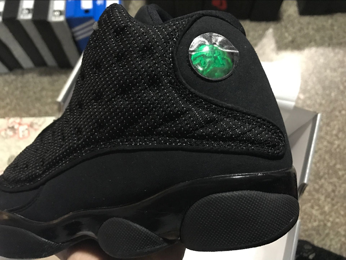 Air Jordan 13 Retro Black Cat Basketball Sneakers in Black - product image from the listing.