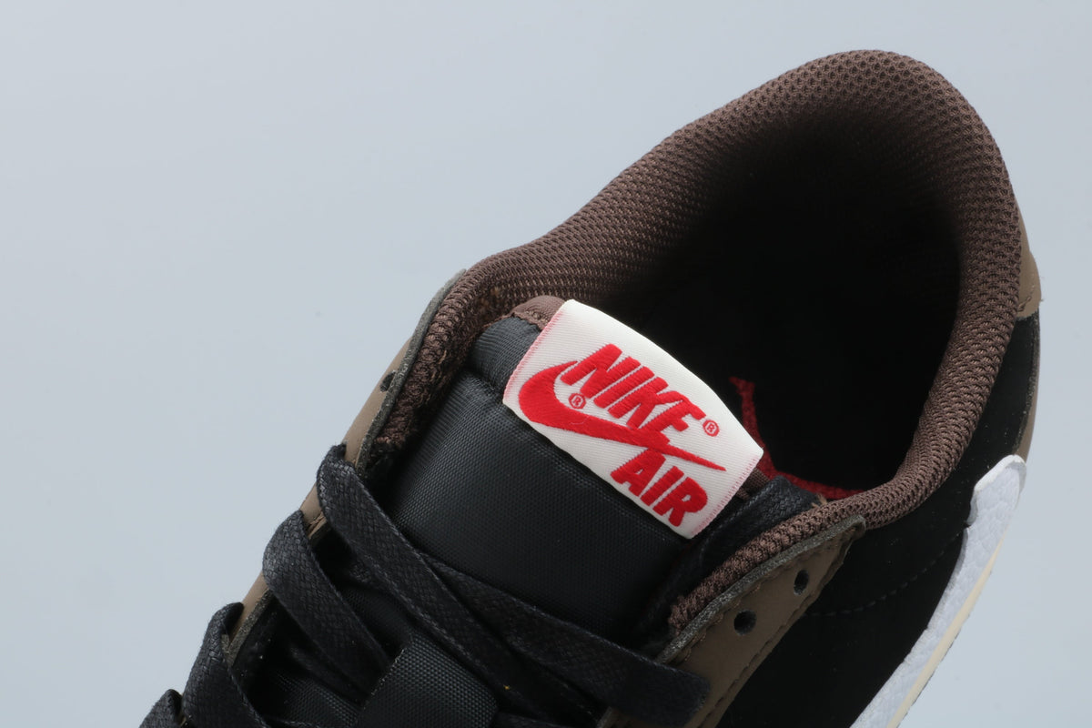 Black and Brown Sneakers with White Swoosh - Jordan 1 Low - product image from the listing.
