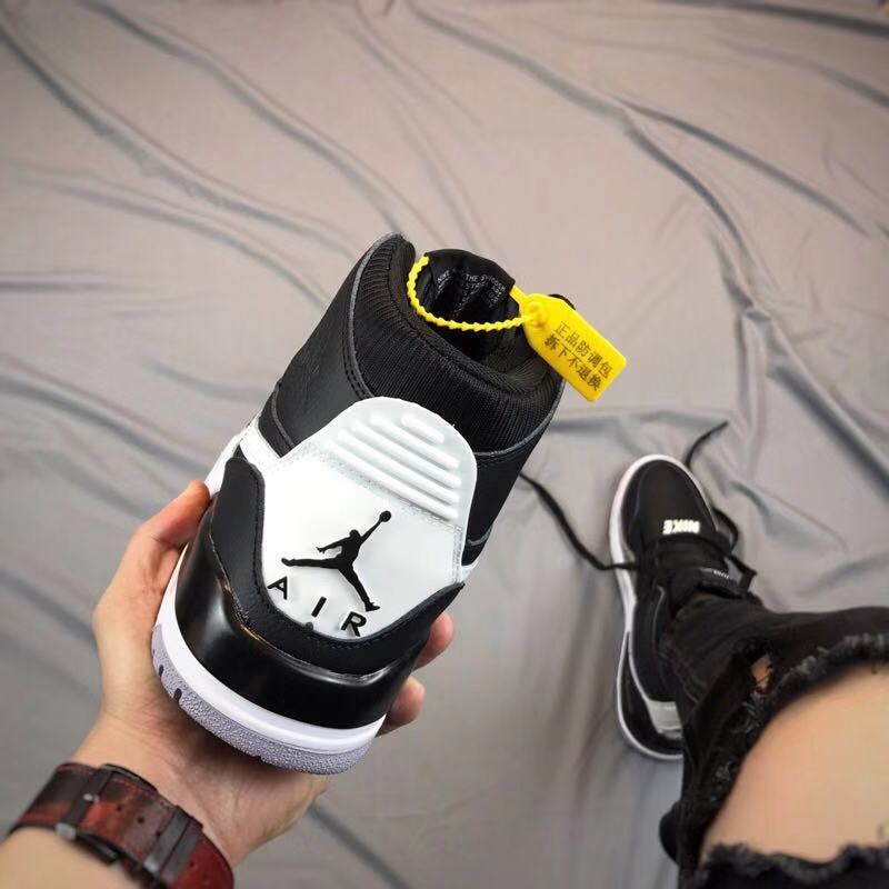 Air Jordan Legacy 312 High-Top Sneakers in Black and White - product image from the listing.