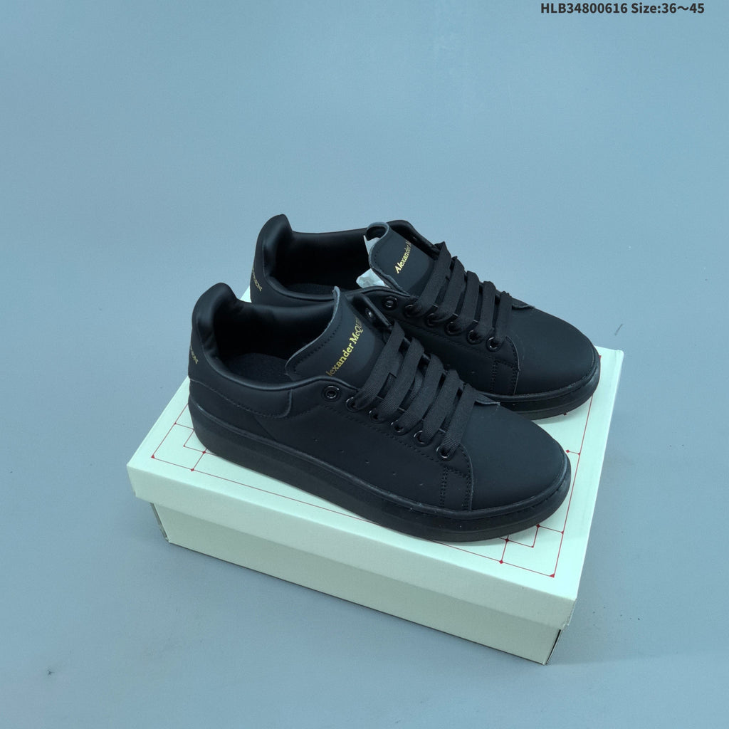 Alexander McQueen Oversized Low-Top Sneakers, in White and Black - product image from the listing.