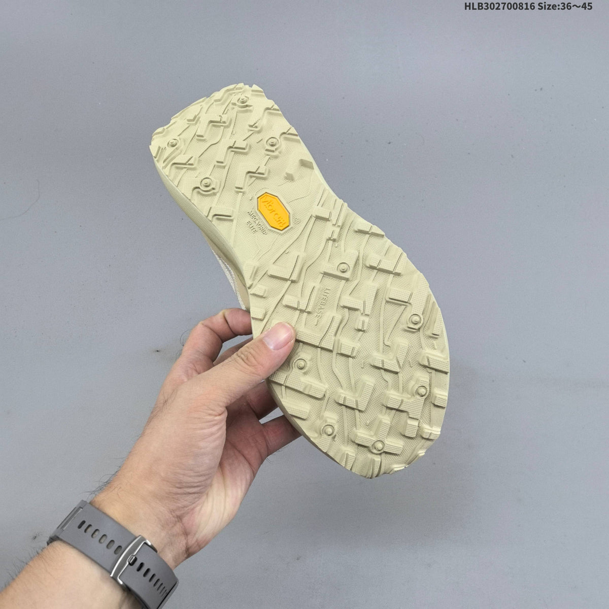 Cream and Black Norda 055 Trail Running Shoes - product image from the listing.