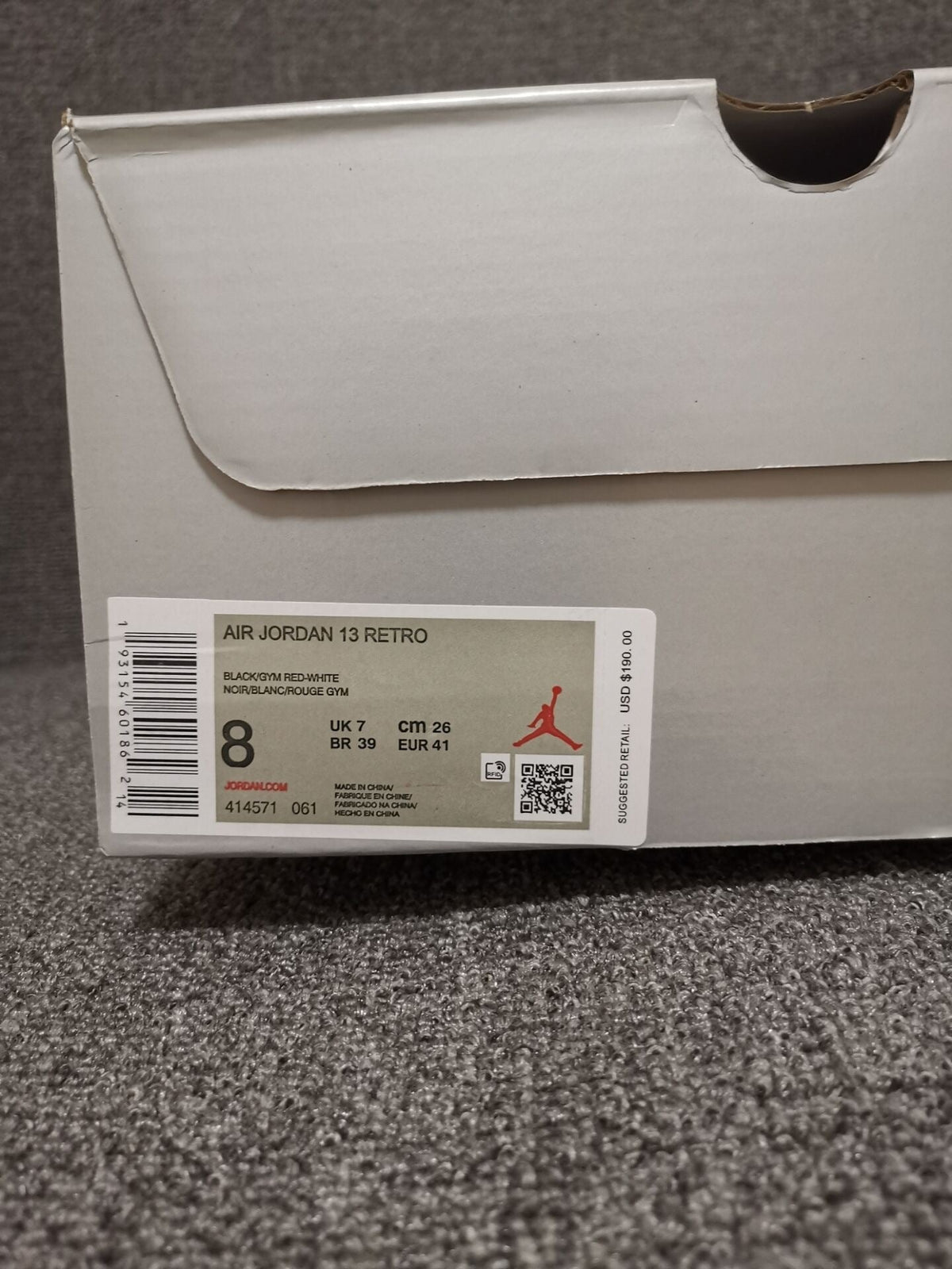 Air Jordan 13 Retro Black Red White Sneakers - product image from the listing.