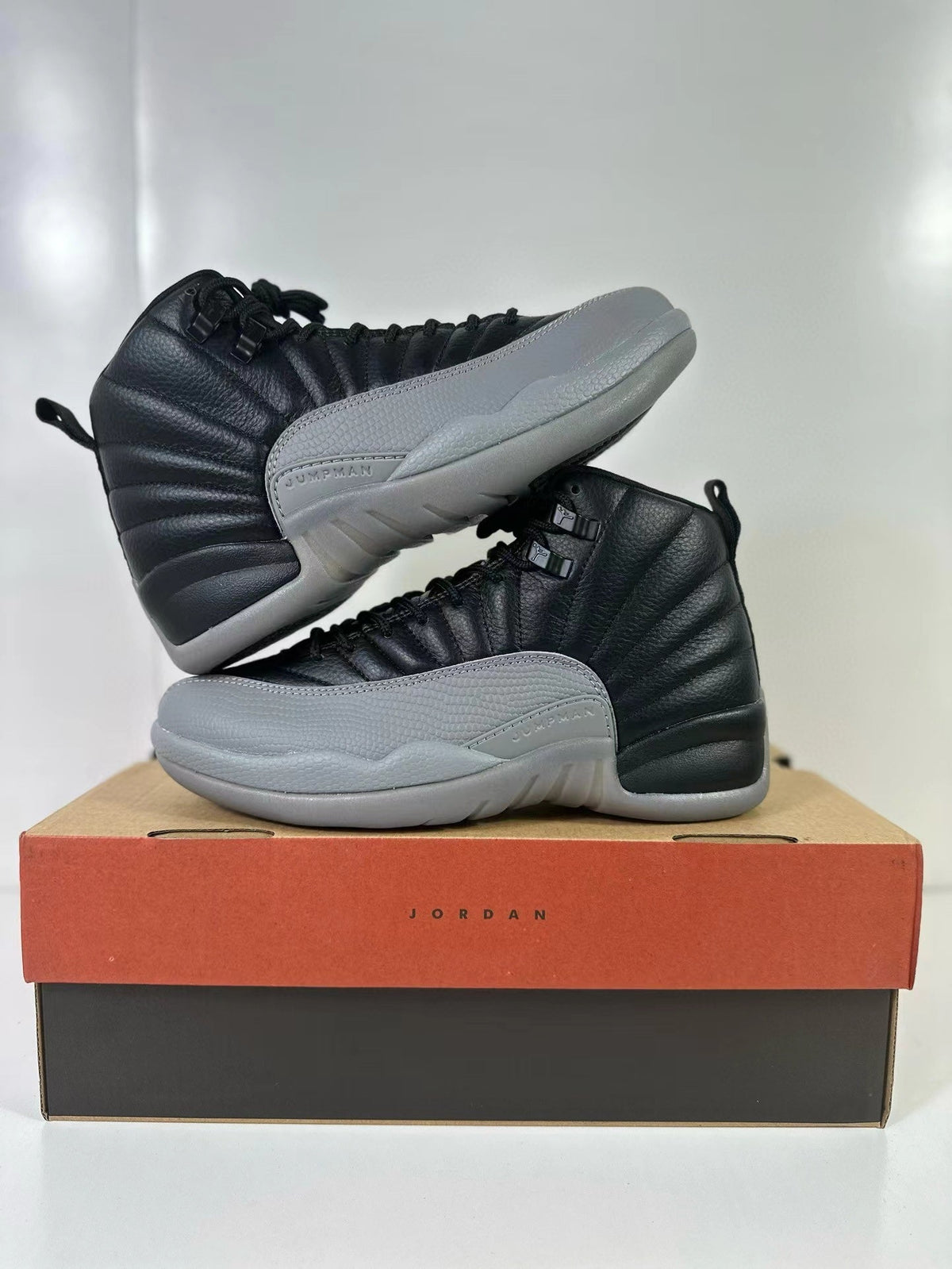 Air Jordan 12 Retro Black Wolf Grey CT8013-019 - product image from the listing.