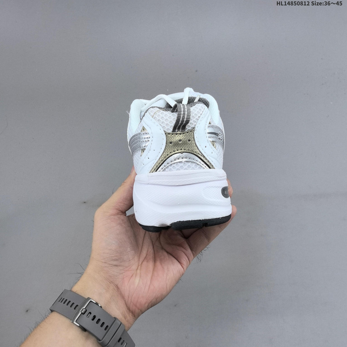 New Balance MR530AD Retro Mesh Sneakers in White Silver - product image from the listing.