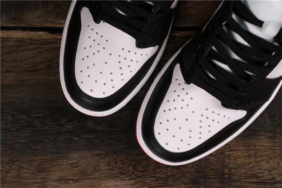 Air Jordan 1 Satin Black Toe High-Cut Sneakers - product image from the listing.