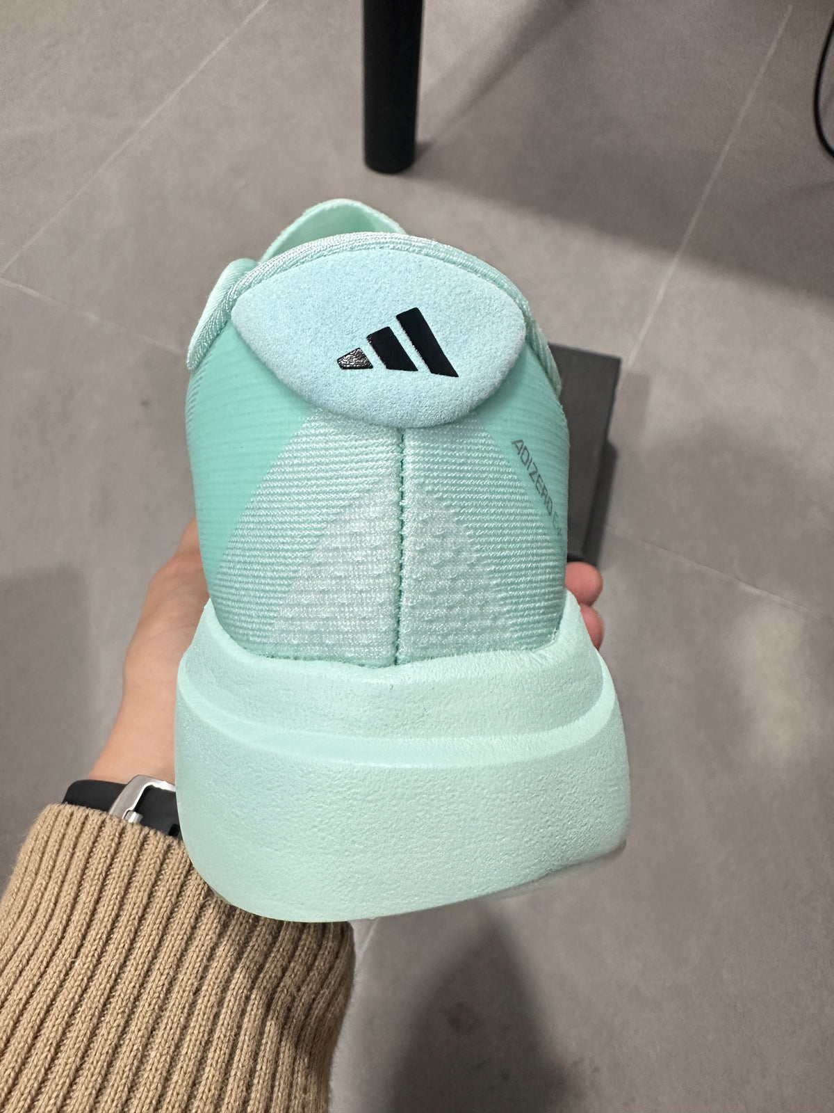 White and Mint adidas Adizero Lightweight Running Shoes - product image from the listing.