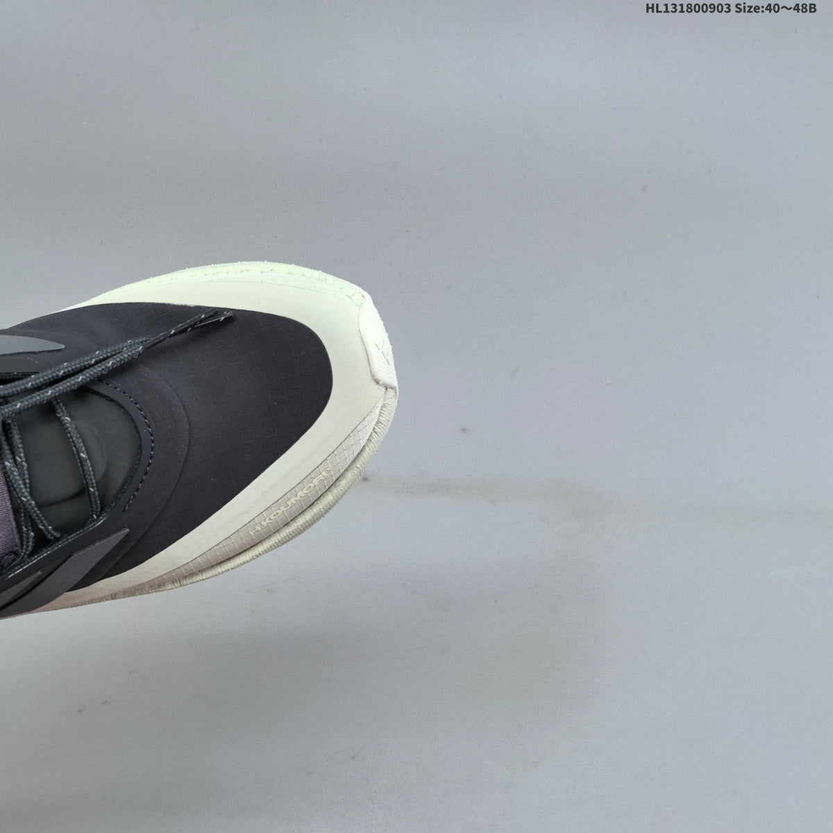 Adidas Ultraboost 5 Running Shoes, in Charcoal and Cream - product image from the listing.