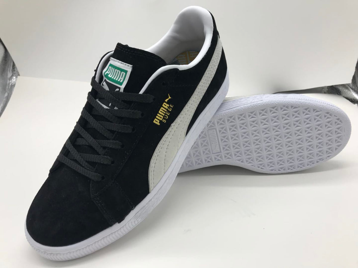 Puma Low-Top Sneakers in Suede Black and White - product image from the listing.