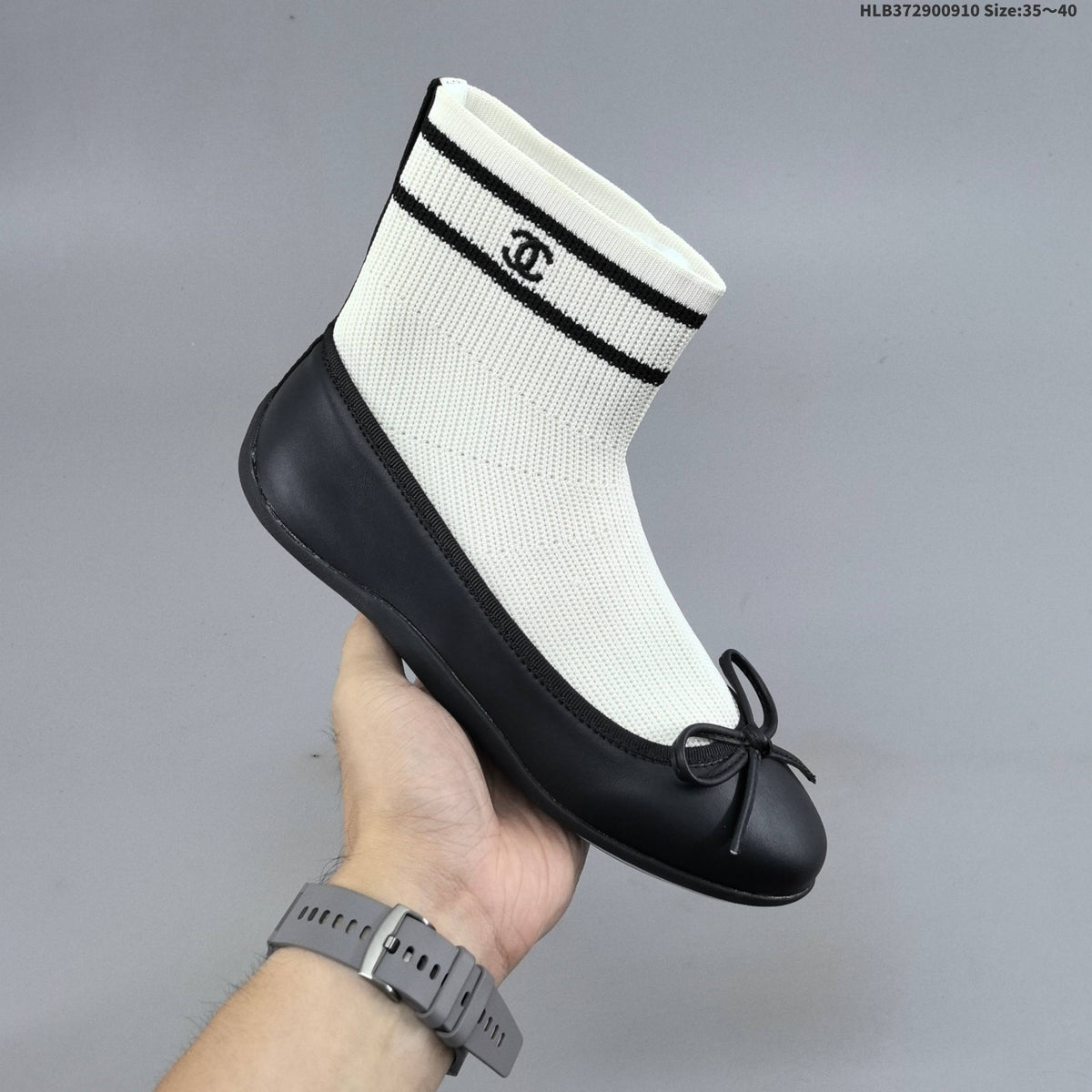 Chanel Sock Ballet Flats with Bow, in Black and White - product image from the listing.