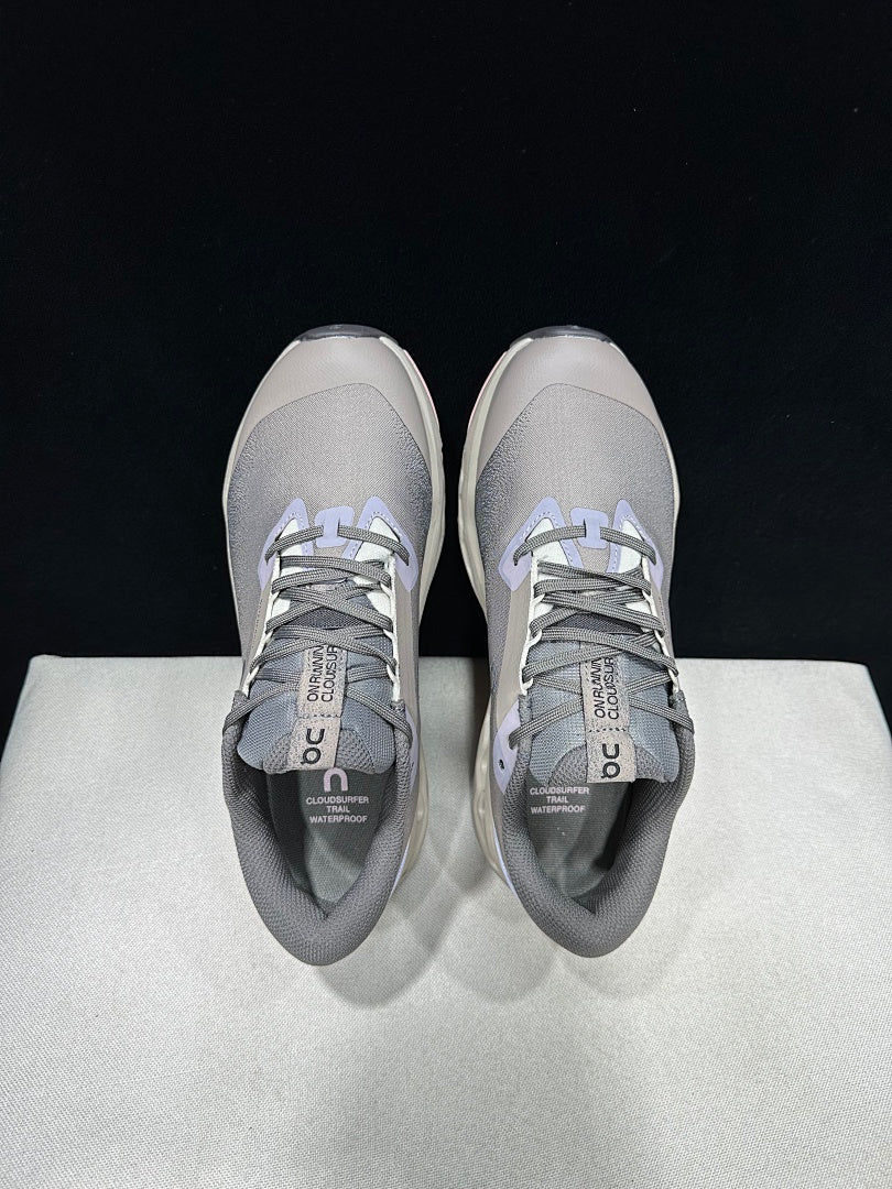 On Cloudsurfer Trail 2 Waterproof Trail Shoes Pink/Brown in Grey - product image from the listing.