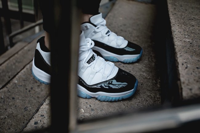White and Black Air Jordan 11 Iridescent Sneakers - product image from the listing.