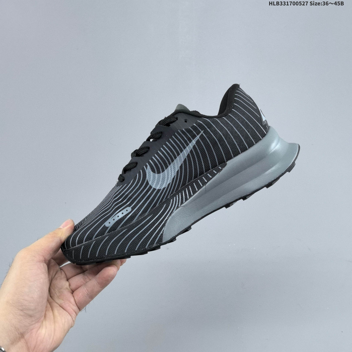 Black and Gray Nike ACG Ultrafly Trail Running Shoes - product image from the listing.