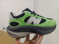New Balance Low-Top Sneakers in Green and Black - product image from the listing.