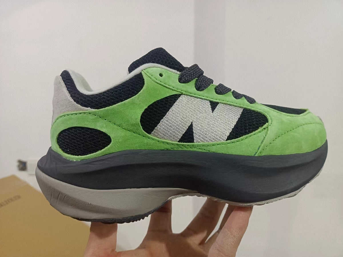 New Balance Low-Top Sneakers in Green and Black - product image from the listing.
