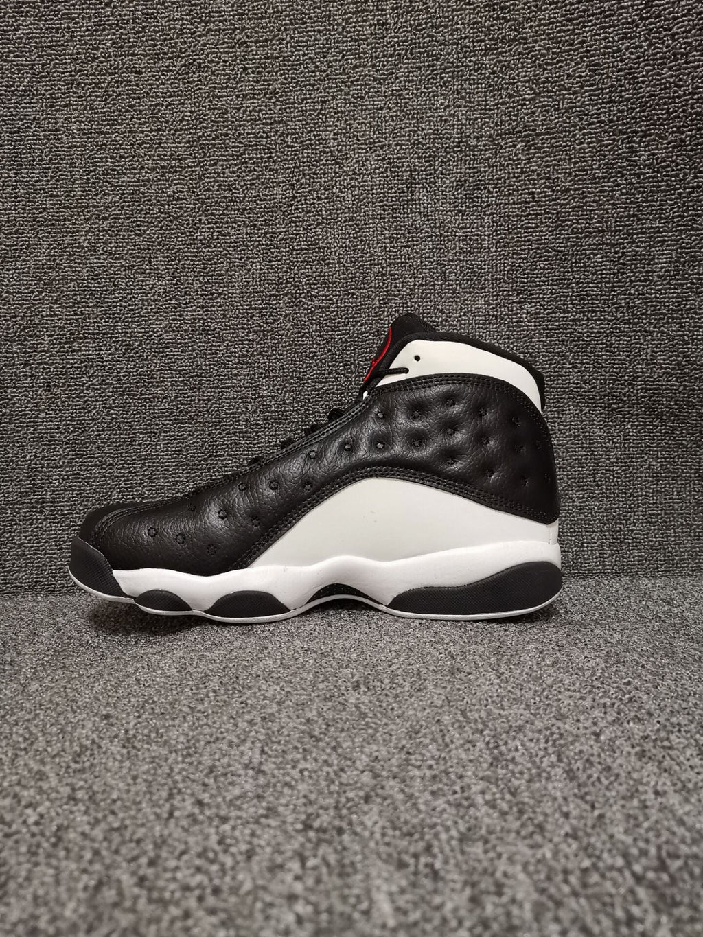 Air Jordan 13 Retro Black Red White Sneakers - product image from the listing.