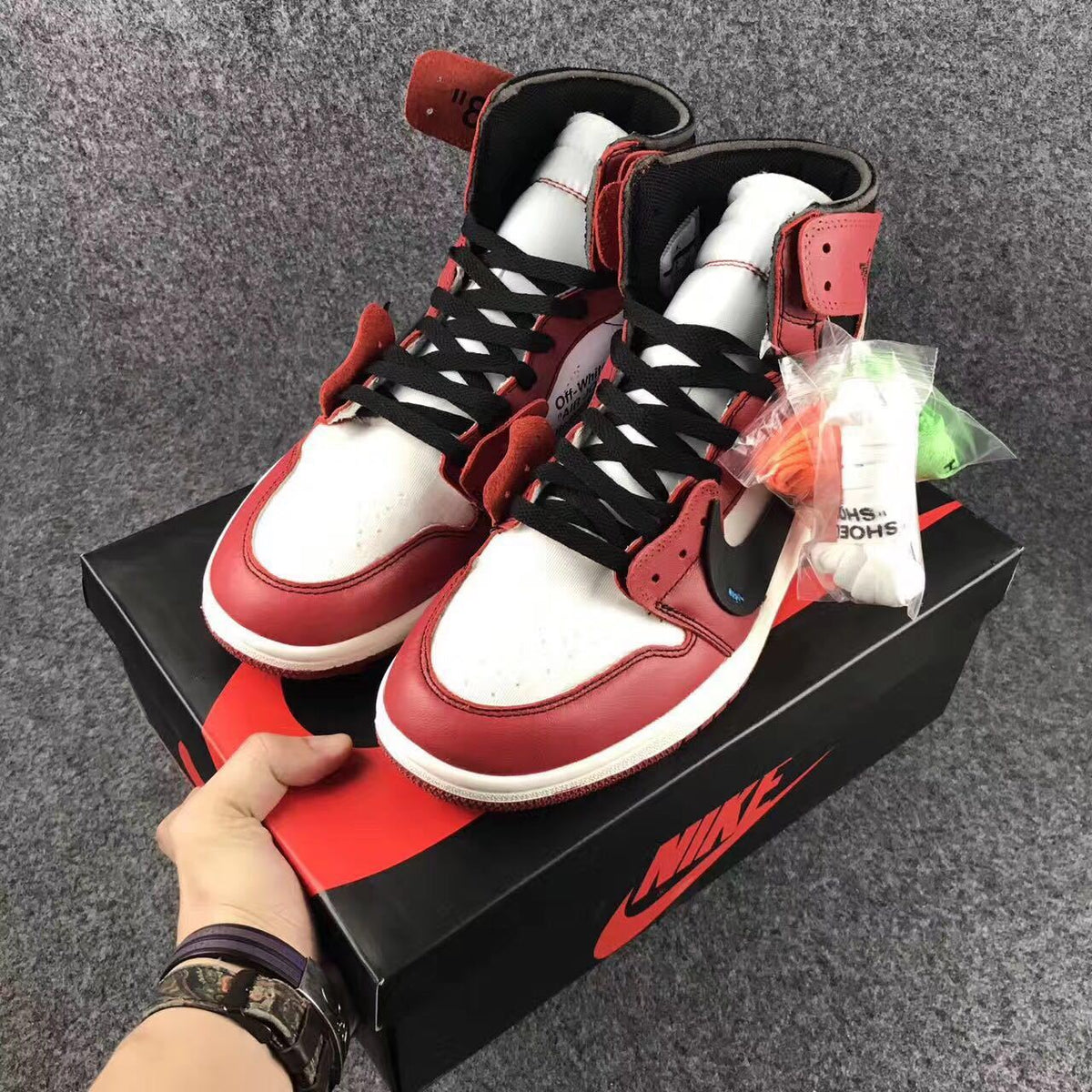 Off-White x Air Jordan 1 High Sneakers, in Red and White - product image from the listing.