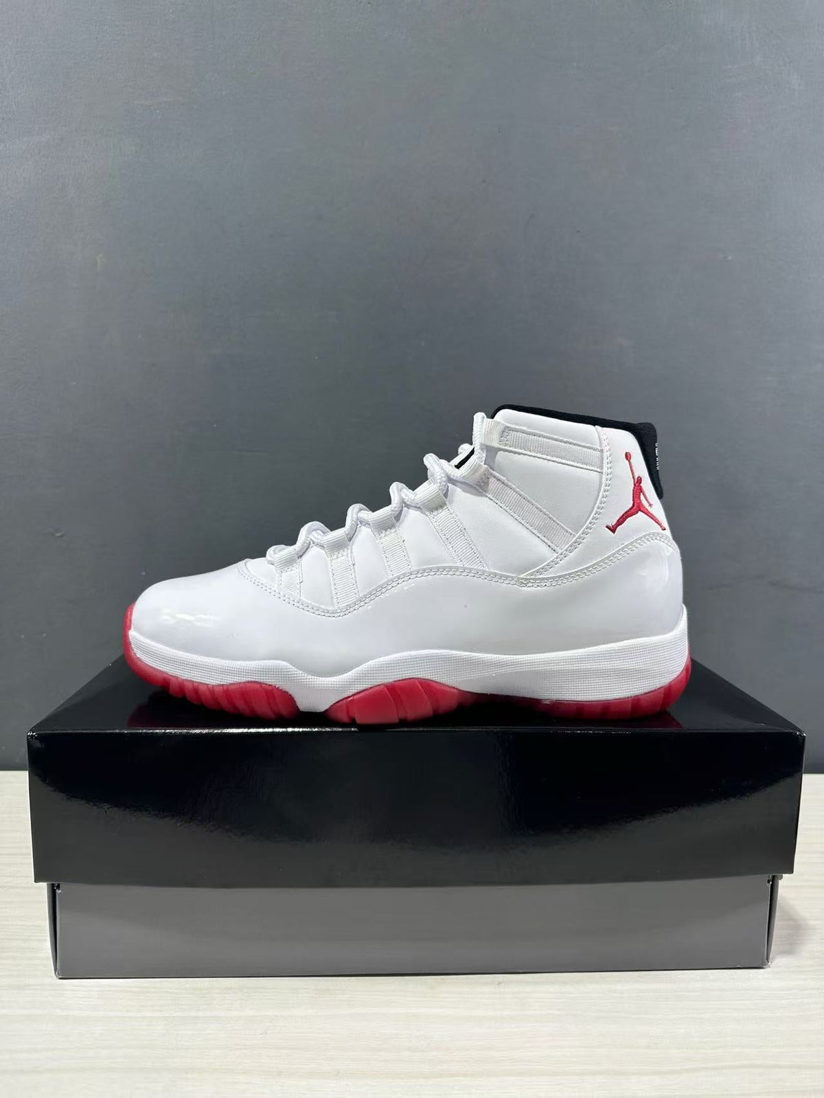 Air Jordan 11 Retro Low White Red CT8012-160 - product image from the listing.