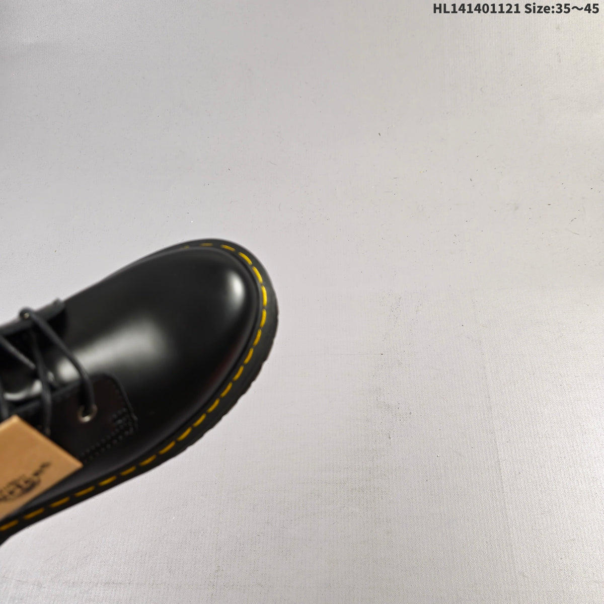 1057 Black Platform Lace-Up Boots by Dr. Martens - product image from the listing.
