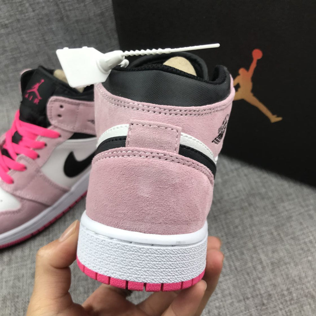 Jordan 1 Mid Sneakers in Pink White Black 852542-801 - product image from the listing.