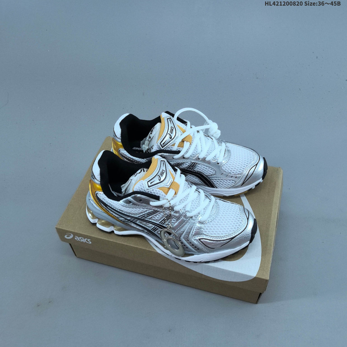 ASICS Gel-Kayano 14 Mesh Sneakers for Running - product image from the listing.