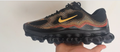 Nike Air Liquid Max Running Sneakers, in Black and Coral - product image from the listing.