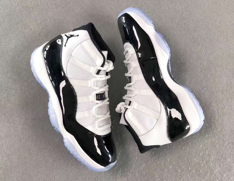 Air Jordan 11 Concord Black White Sneakers - product image from the listing.
