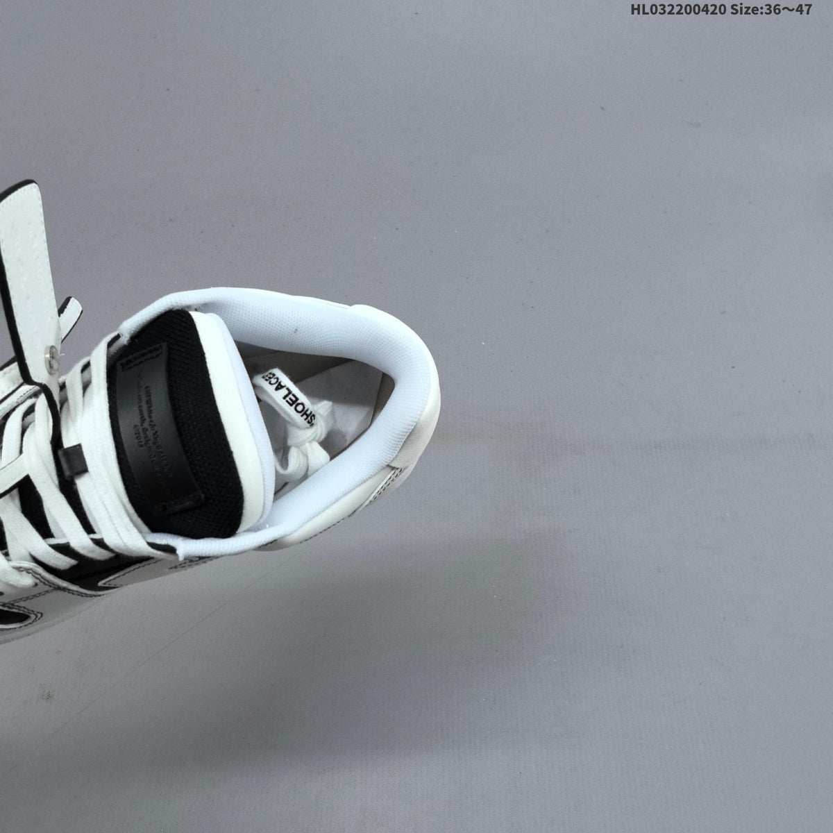 White and Black Off-White Arrows Low-Top Sneakers - product image from the listing.